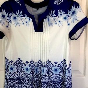 Short-sleeve vibrant blue/white blouse. Unknown brand. 100% polyester. Large.